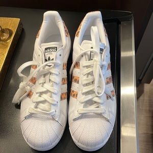Adidas originals. Womens 8.5. Never worn. Animal print stripe detail.